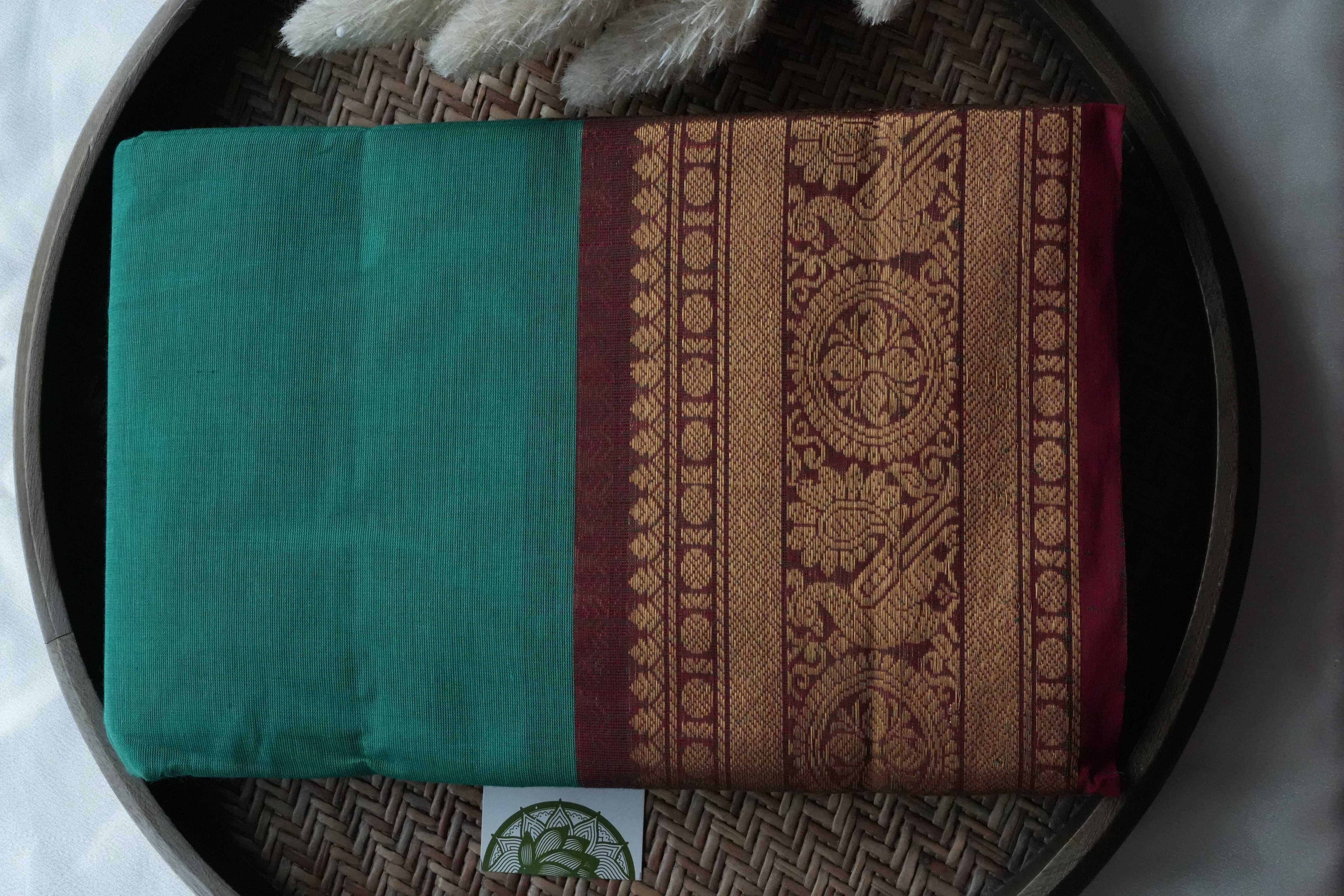 Elegant Emerald Green Kanchi Cotton Saree with Rich Traditional Borders
