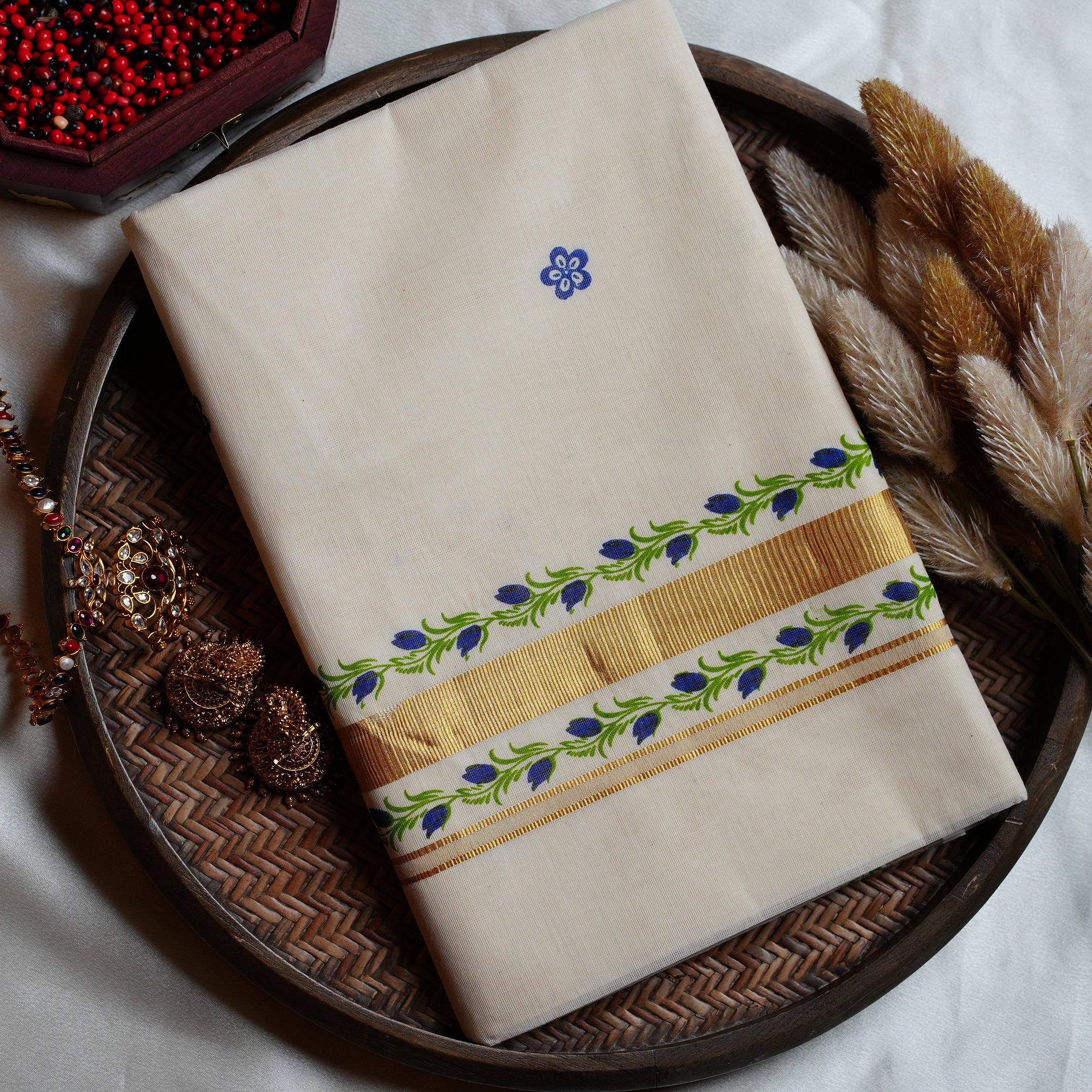 Artistically Hand-Painted Traditional Kerala Saree with Blue Floral Vine & Gold Accents