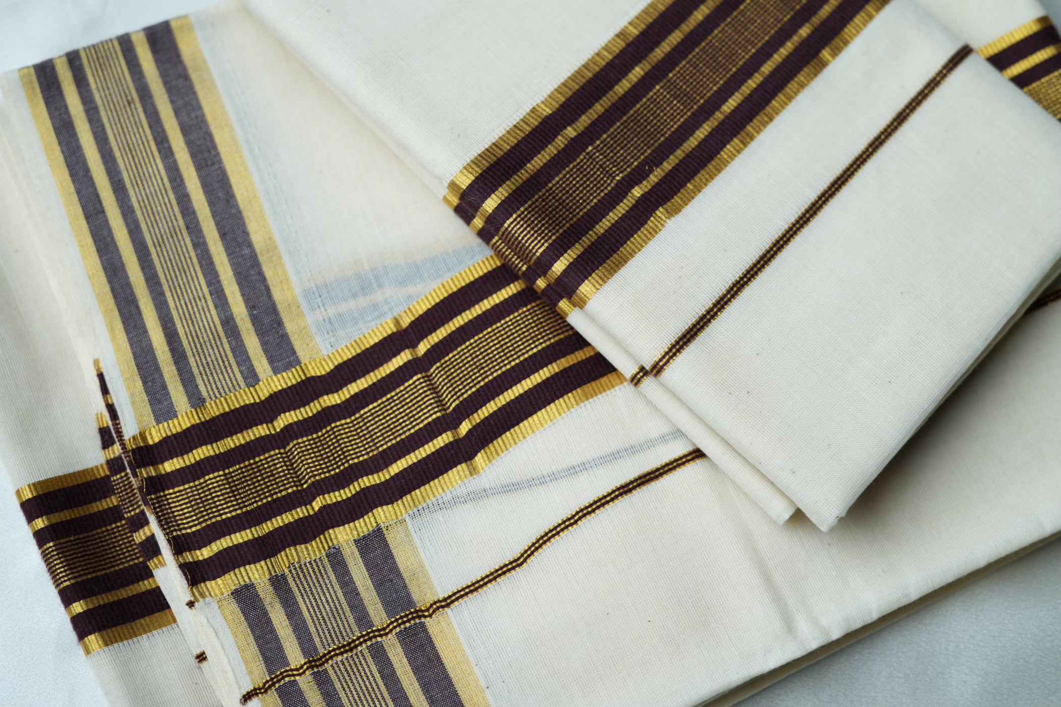 Contemporary Kerala Single Set Mundu with Bold Vibrant Striped Brown Borders