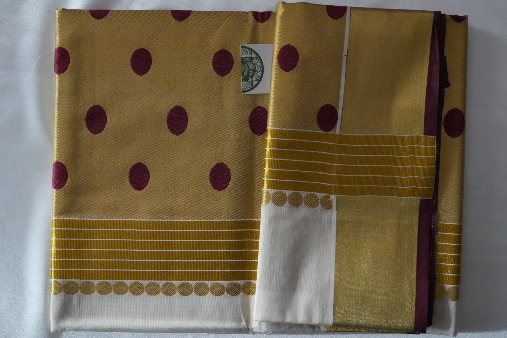 Golden Tissue Kerala Saree with Deep Maroon Polka Dots