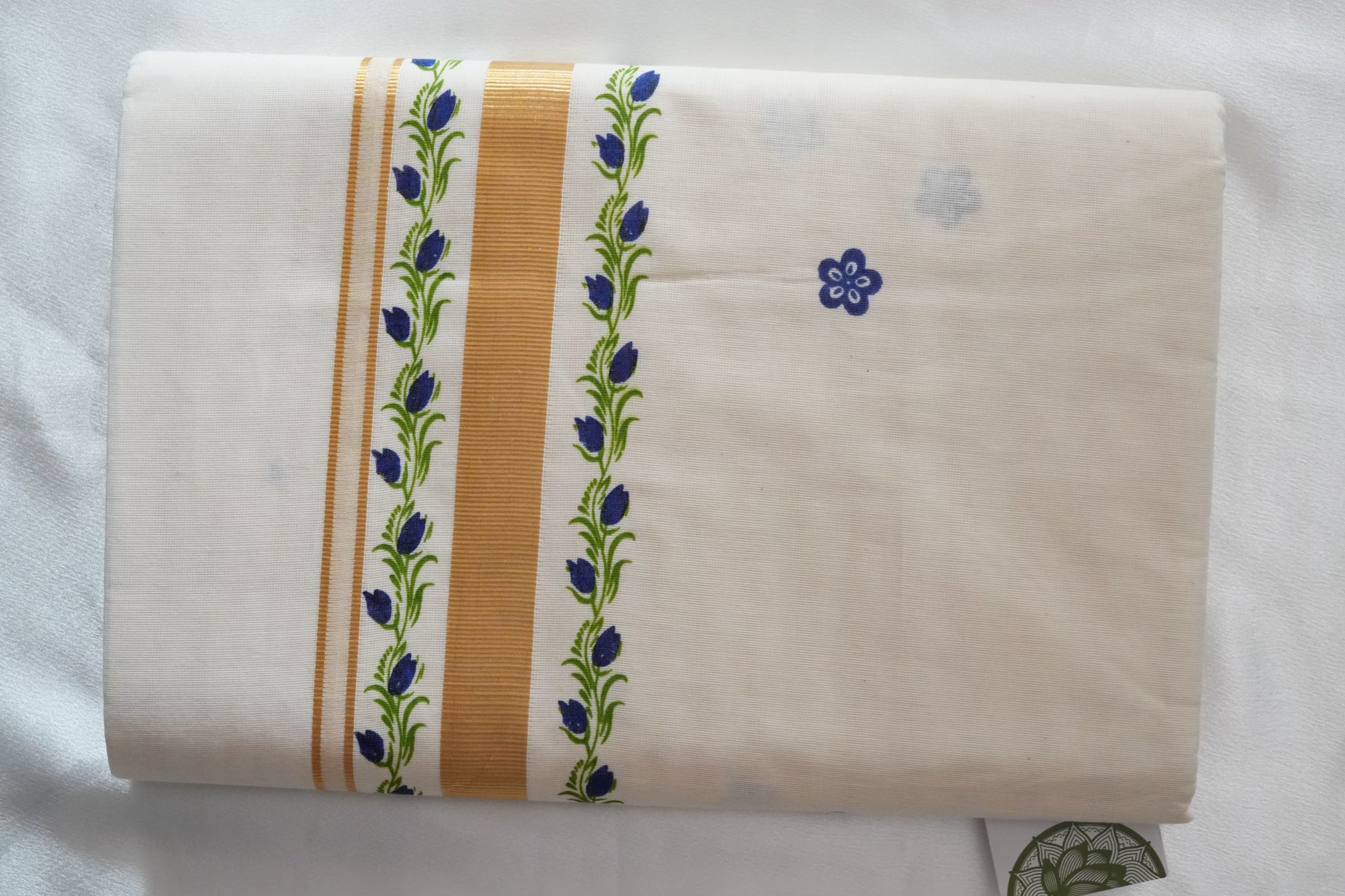 Artistically Hand-Painted Traditional Kerala Saree with Blue Floral Vine & Gold Accents