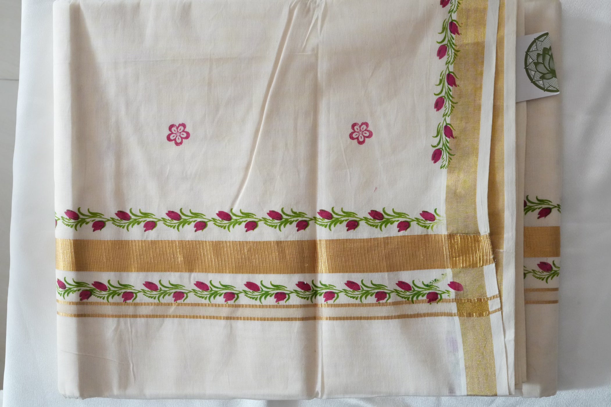 Artistically Hand-Painted Traditional Kerala Saree with Pink Floral Vine & Gold Accents