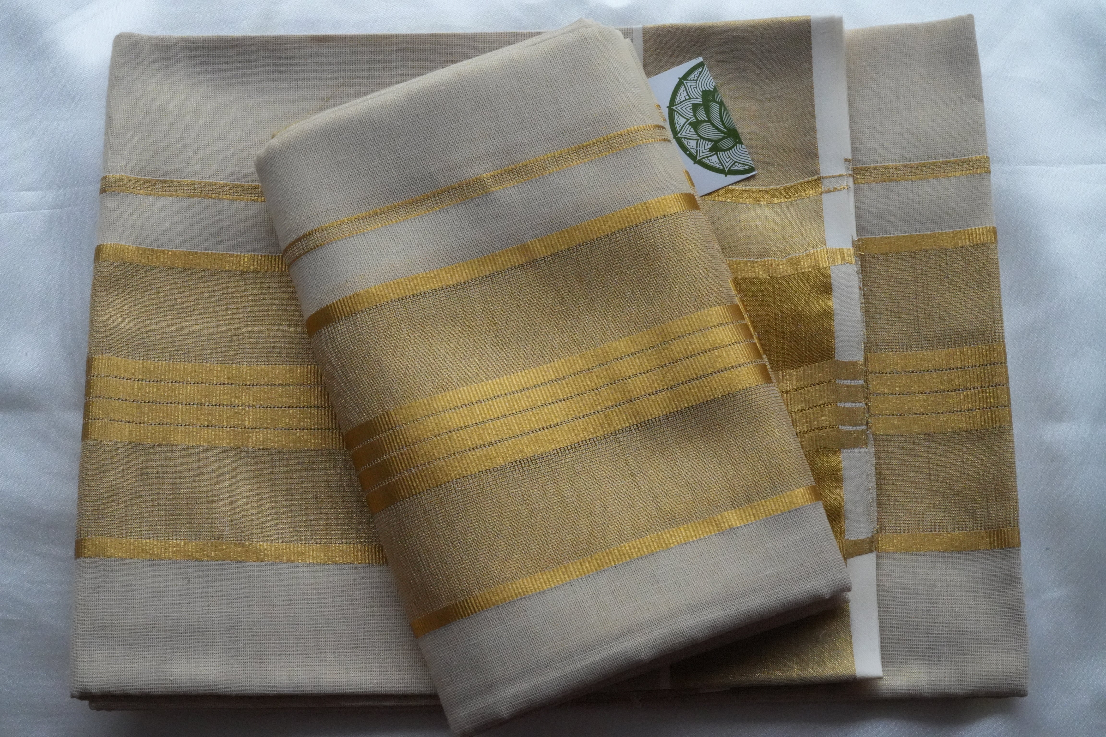 Radiant Golden Tissue Kerala Set Mundu with Minimalist Zari Borders
