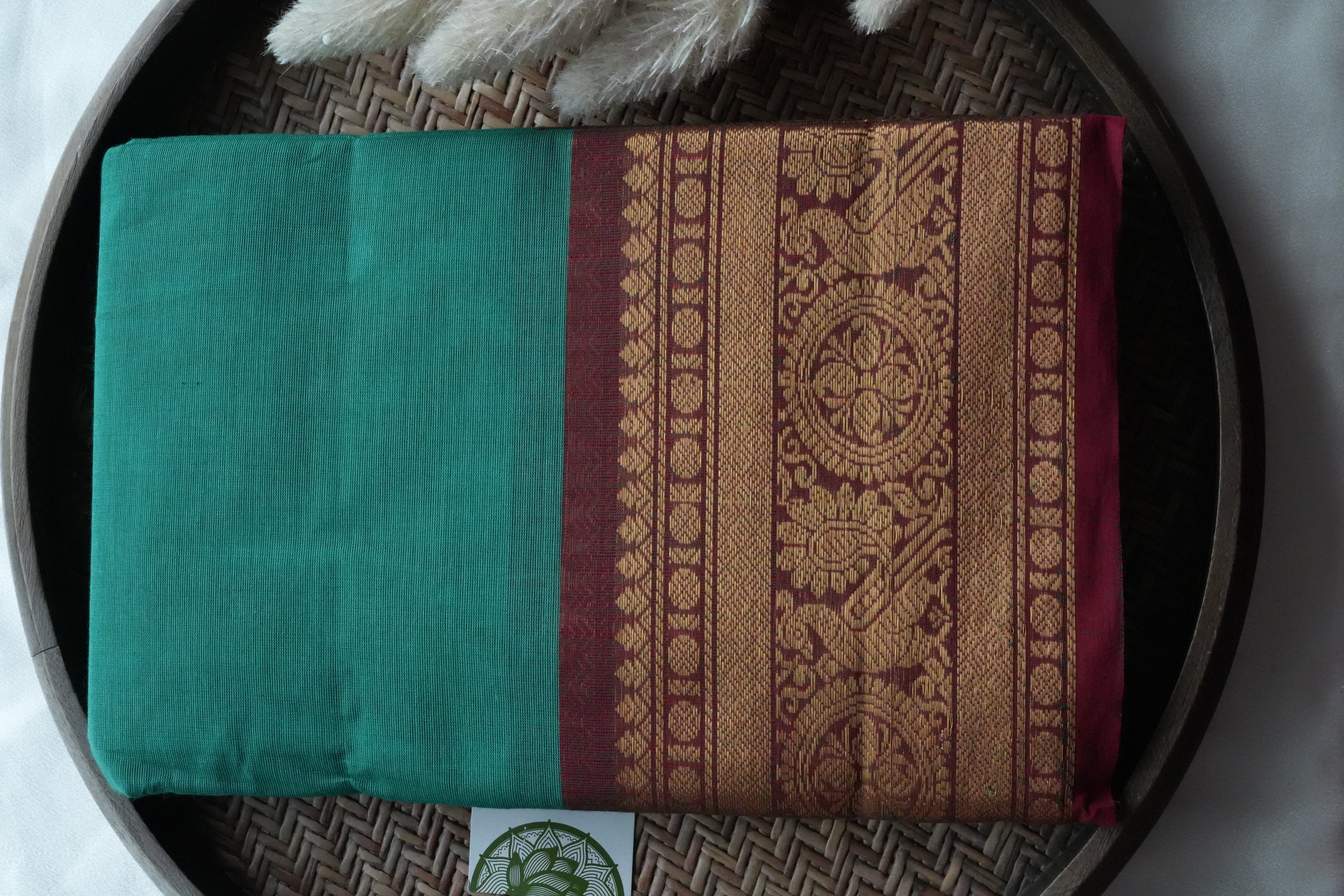 Elegant Emerald Green Kanchi Cotton Saree with Rich Traditional Borders