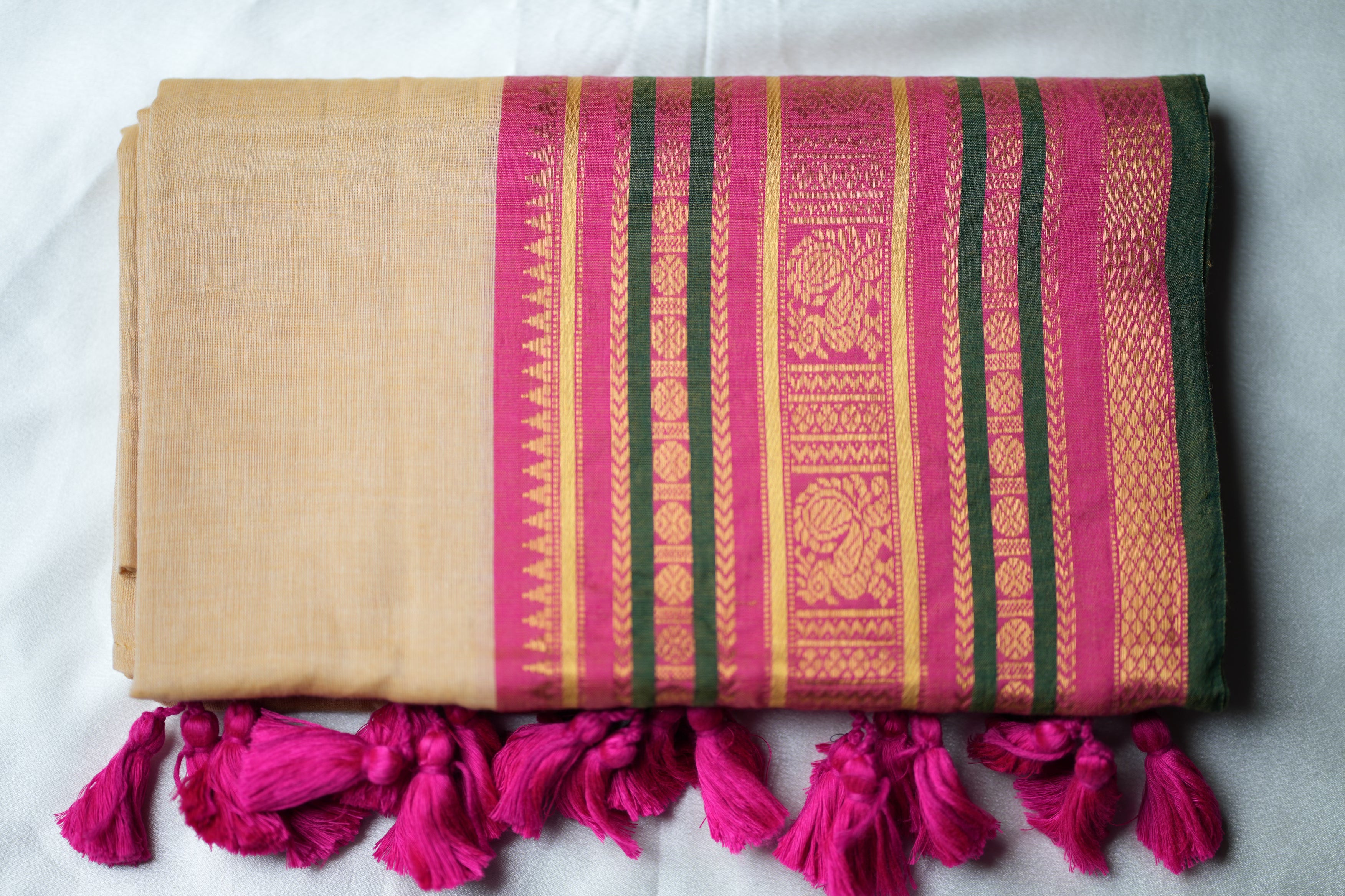 Elegant Sand-Beige body Mul Cotton Saree with Magenta & Emerald Borders