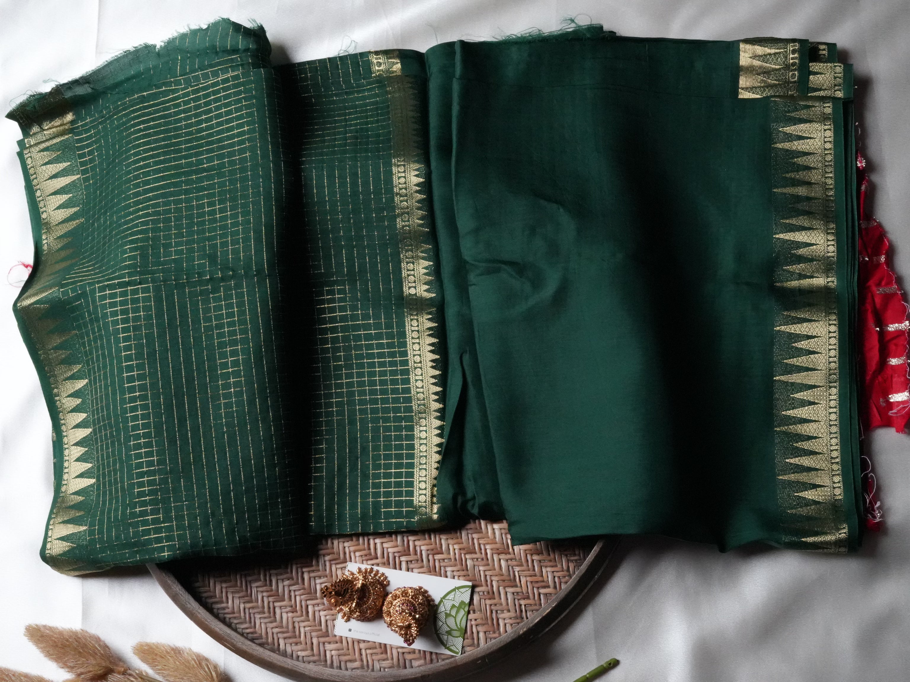 Festive Bottle Green Mysore Crepe Semi Silk Saree with contrasting red blouse