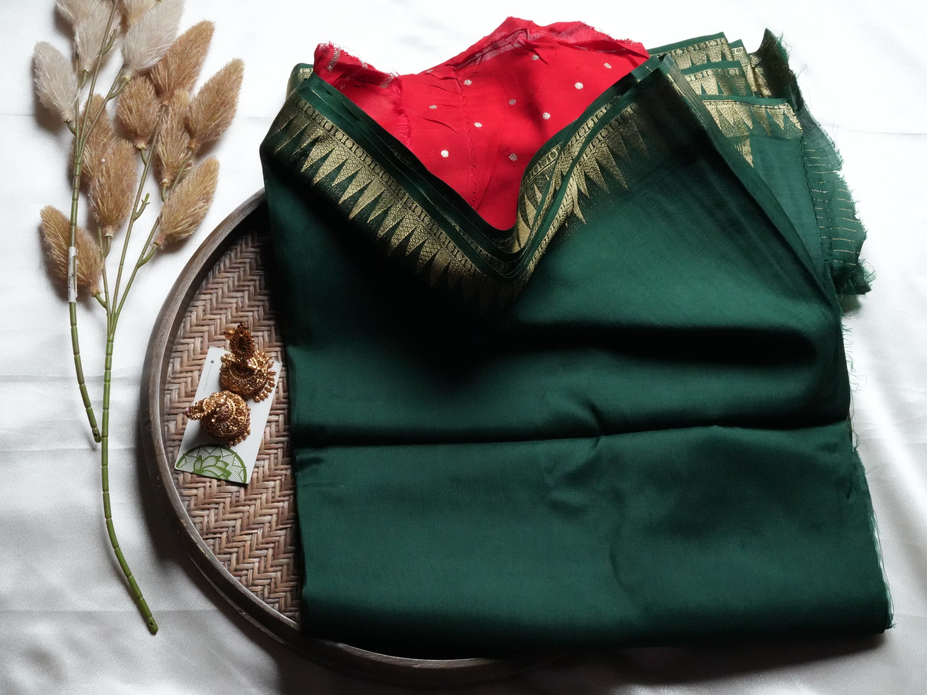 Festive Bottle Green Mysore Crepe Semi Silk Saree with contrasting red blouse