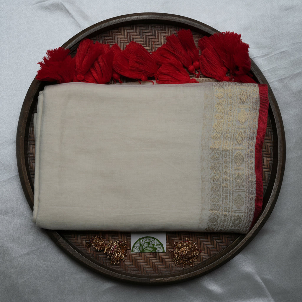 Elegant Ivory Mul Cotton Saree with Crimson Tassels