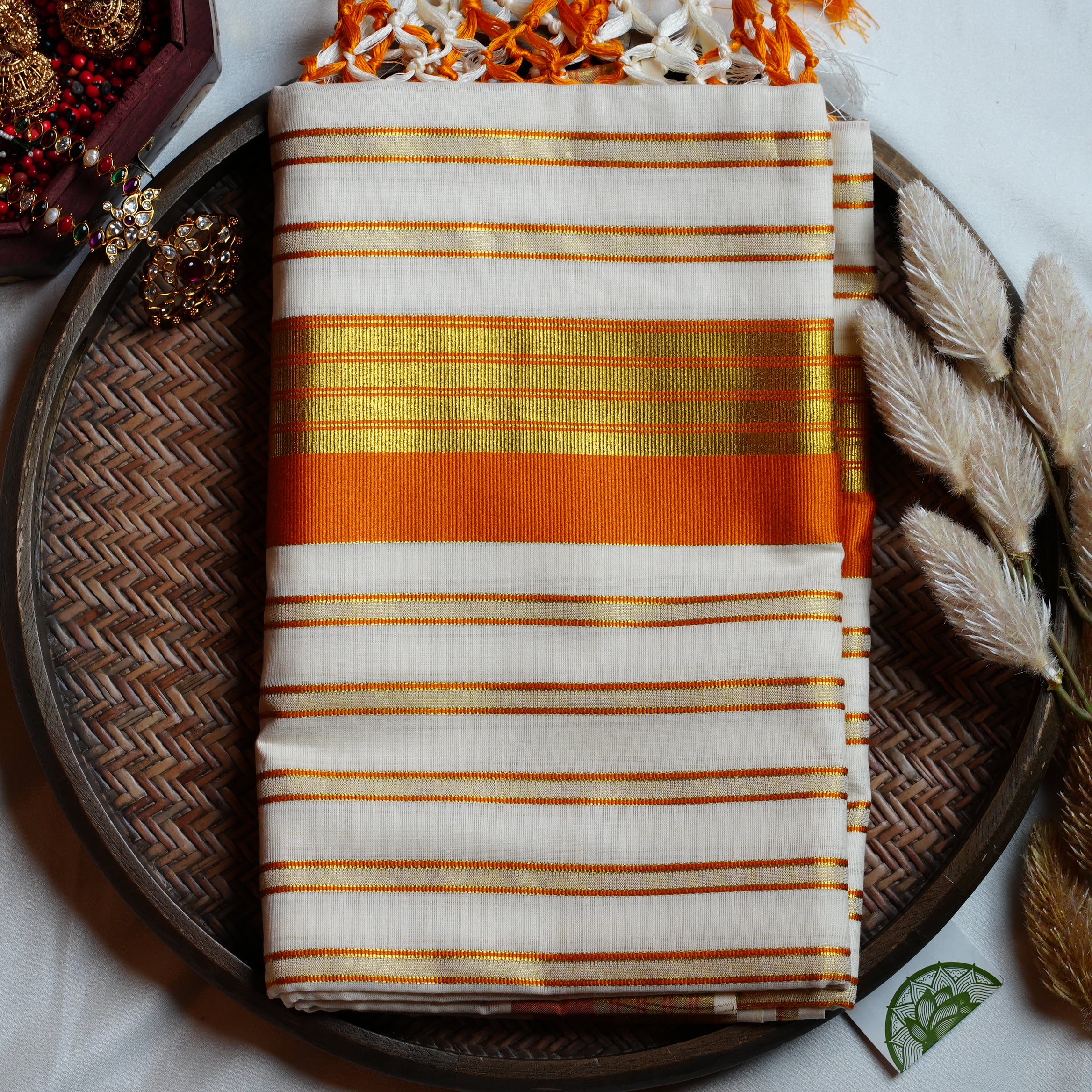 🍊 Festive Orange & Shimmering Gold Kerala Saree with Handcrafted Tassels ☀️