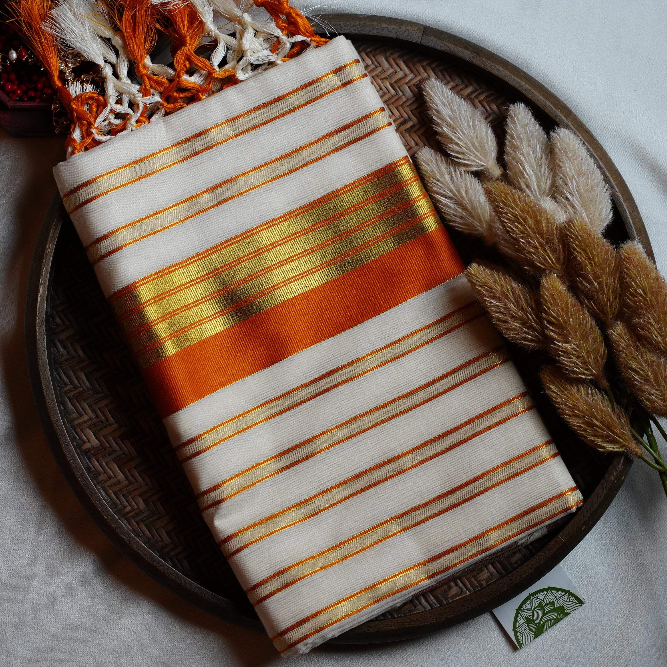 🍊 Festive Orange & Shimmering Gold Kerala Saree with Handcrafted Tassels ☀️