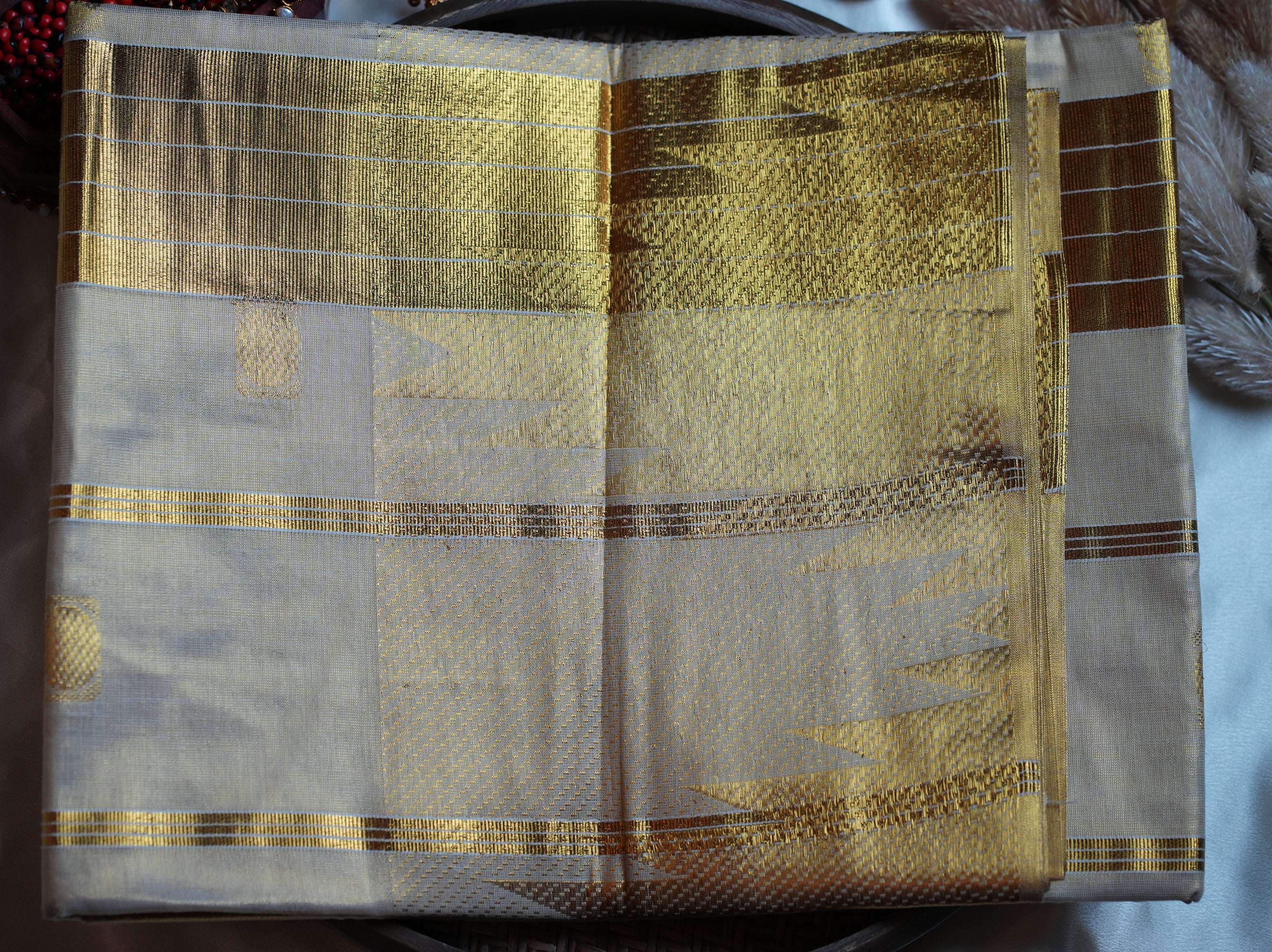 ✨ Premium Gold Tissue Kerala Saree with Geometric Zari Motifs 🌟