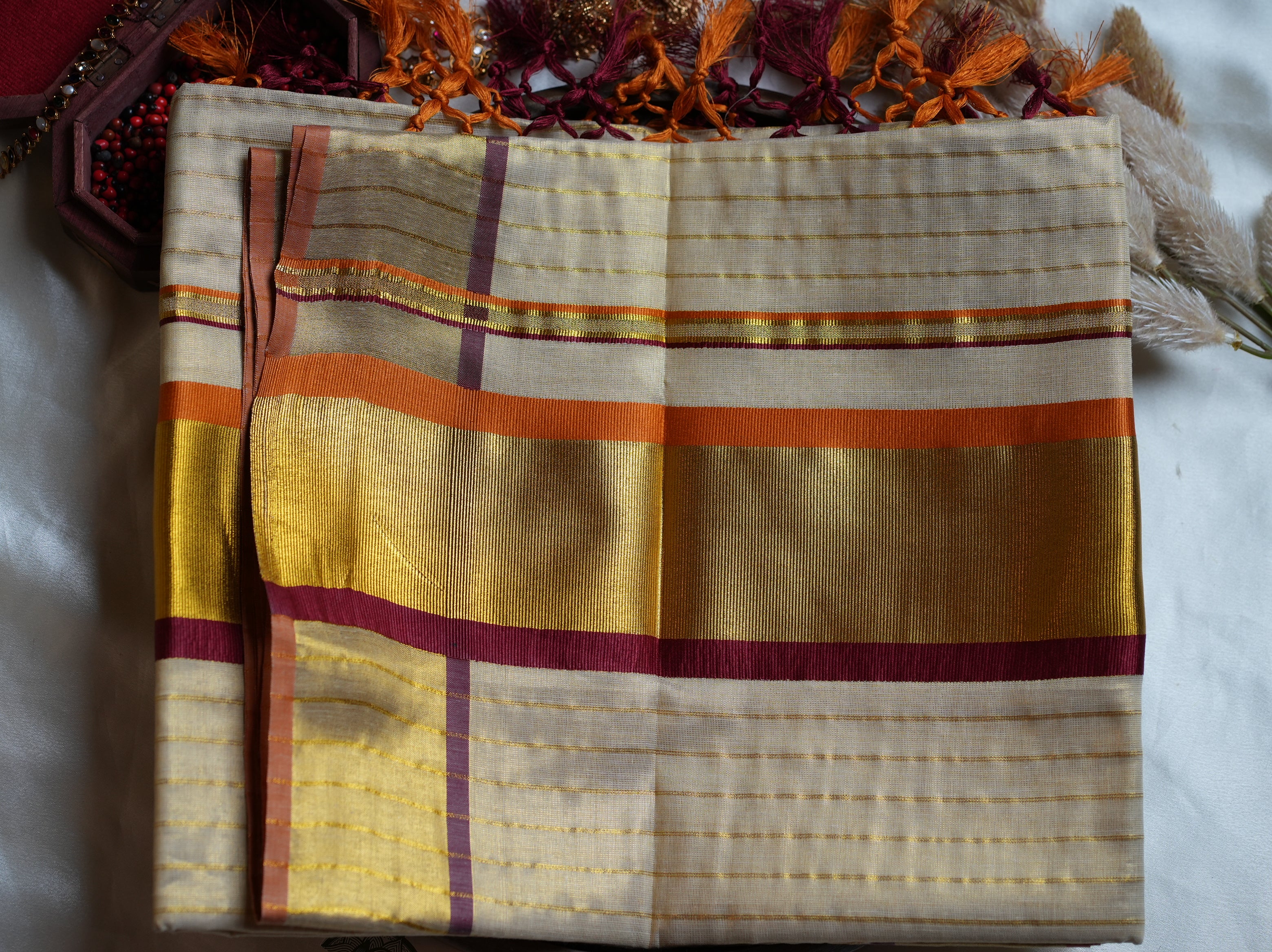 ✨ Sunset Radiance: Premium Tissue Kerala Saree with Orange & Maroon Contrast Border 🌟