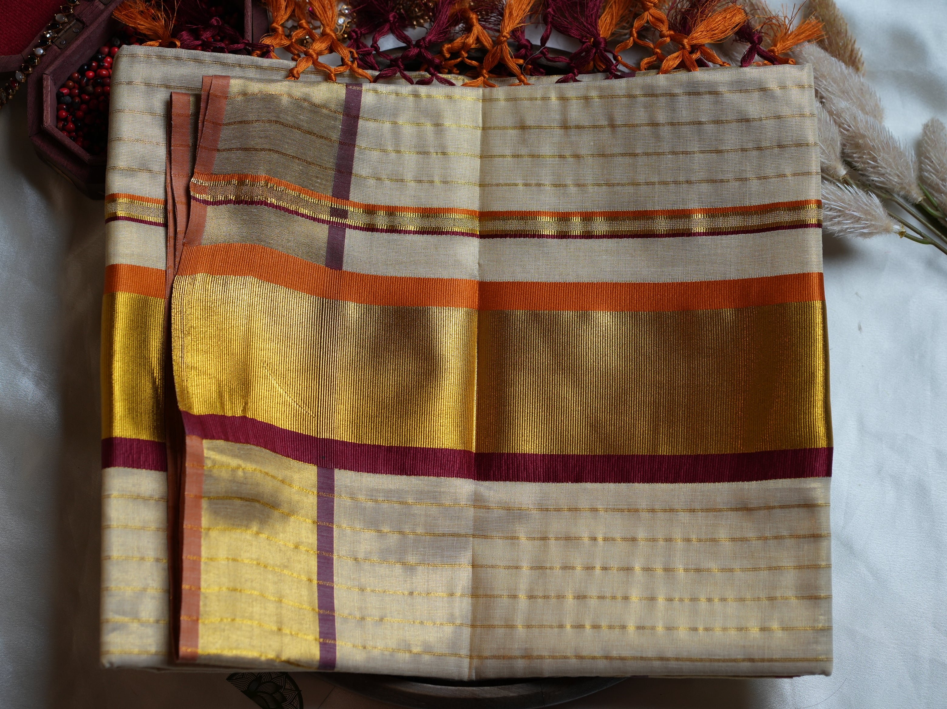 ✨ Sunset Radiance: Premium Tissue Kerala Saree with Orange & Maroon Contrast Border 🌟