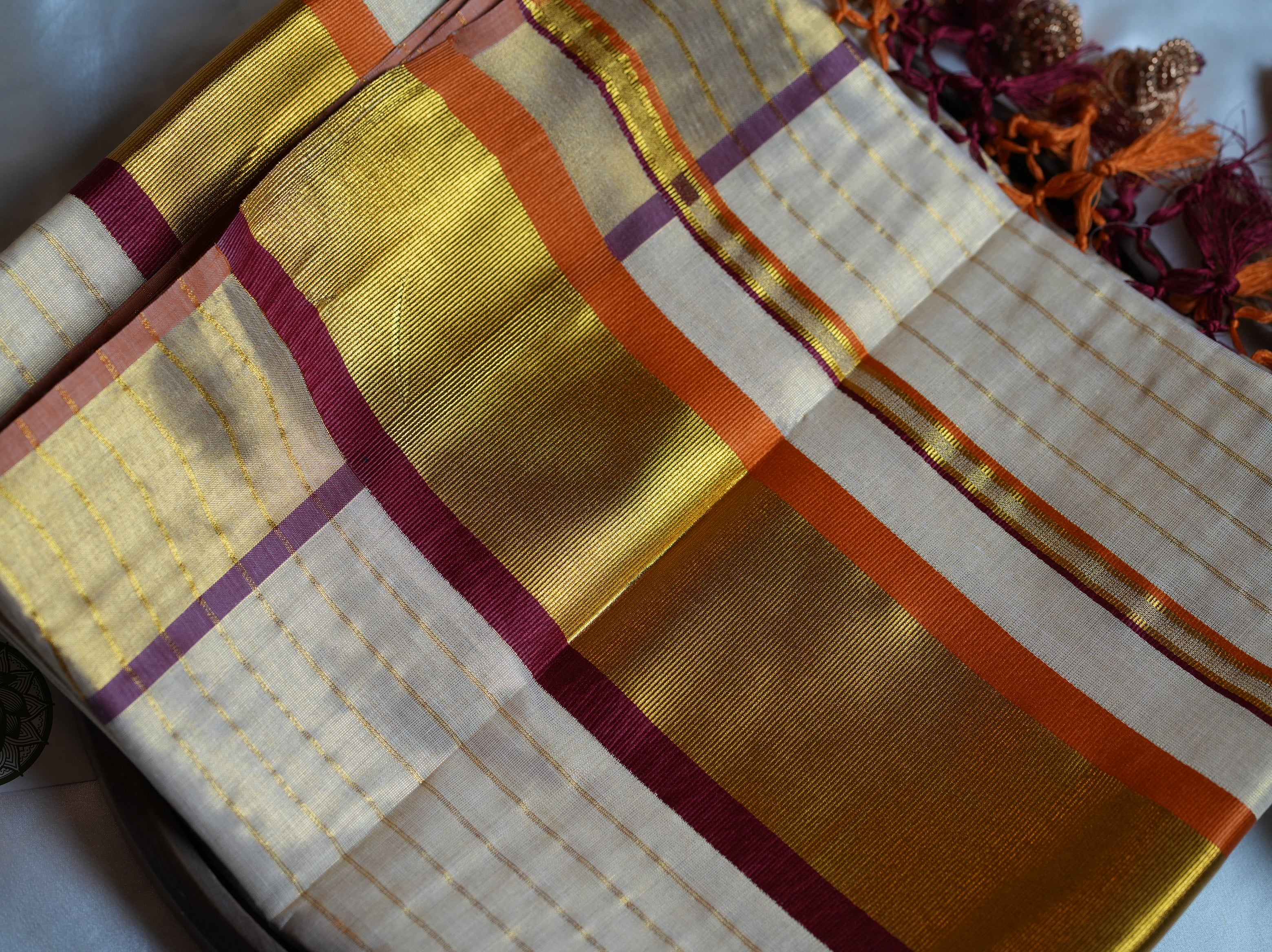 ✨ Sunset Radiance: Premium Tissue Kerala Saree with Orange & Maroon Contrast Border 🌟