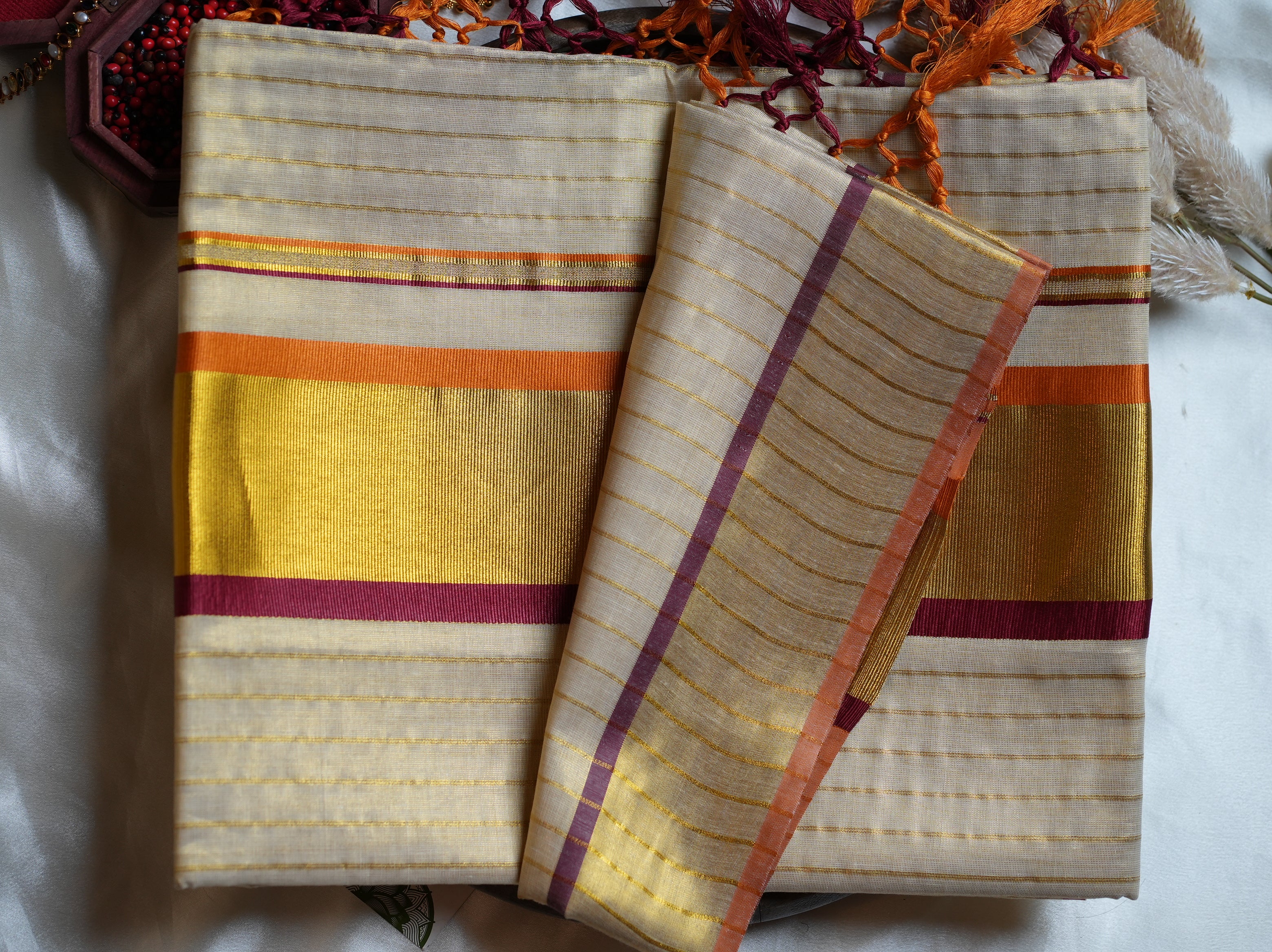 ✨ Sunset Radiance: Premium Tissue Kerala Saree with Orange & Maroon Contrast Border 🌟