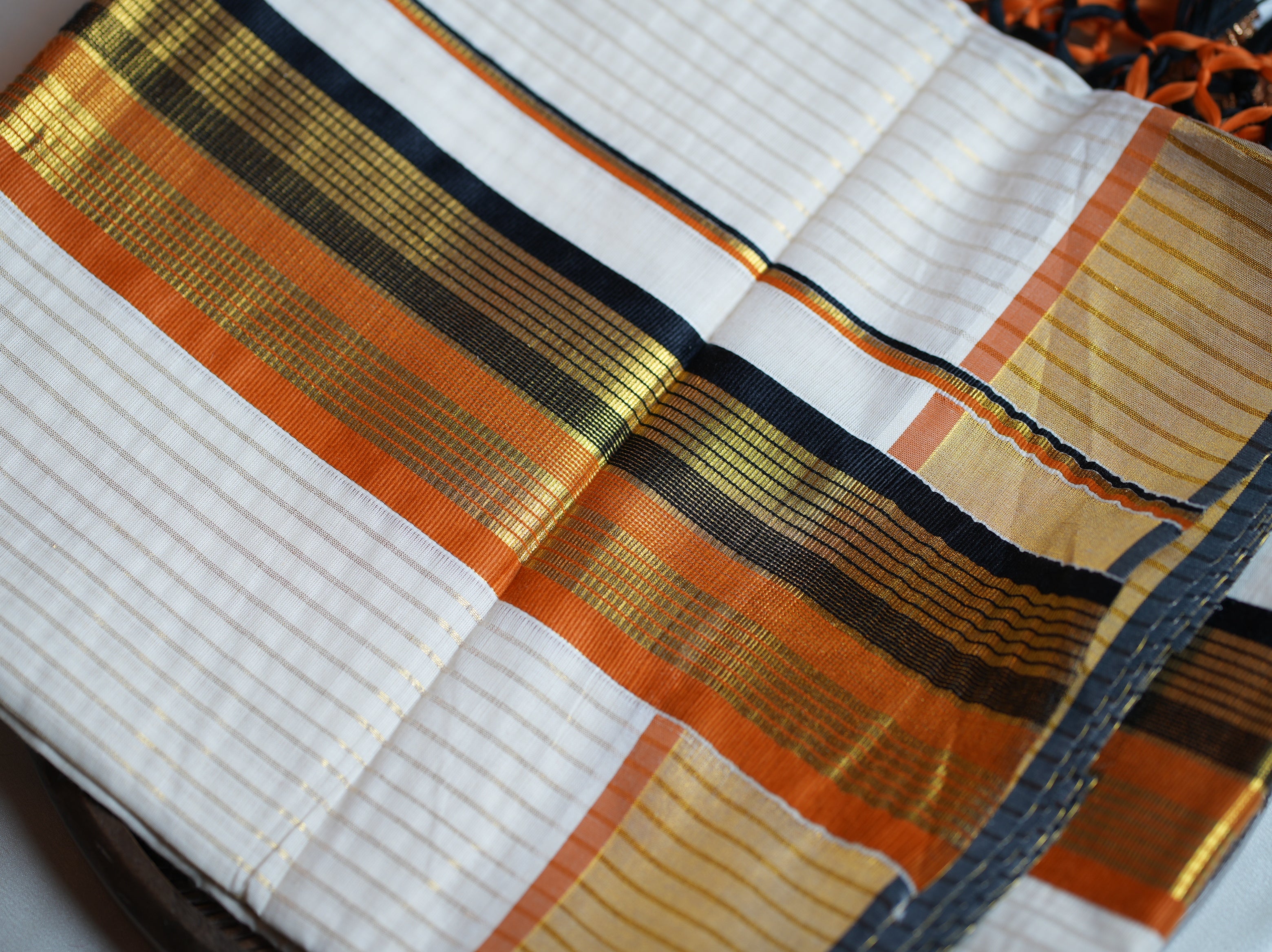 🎨 Burnt Orange & Charcoal Gold Cotton Kerala Saree with Tassels 🌟