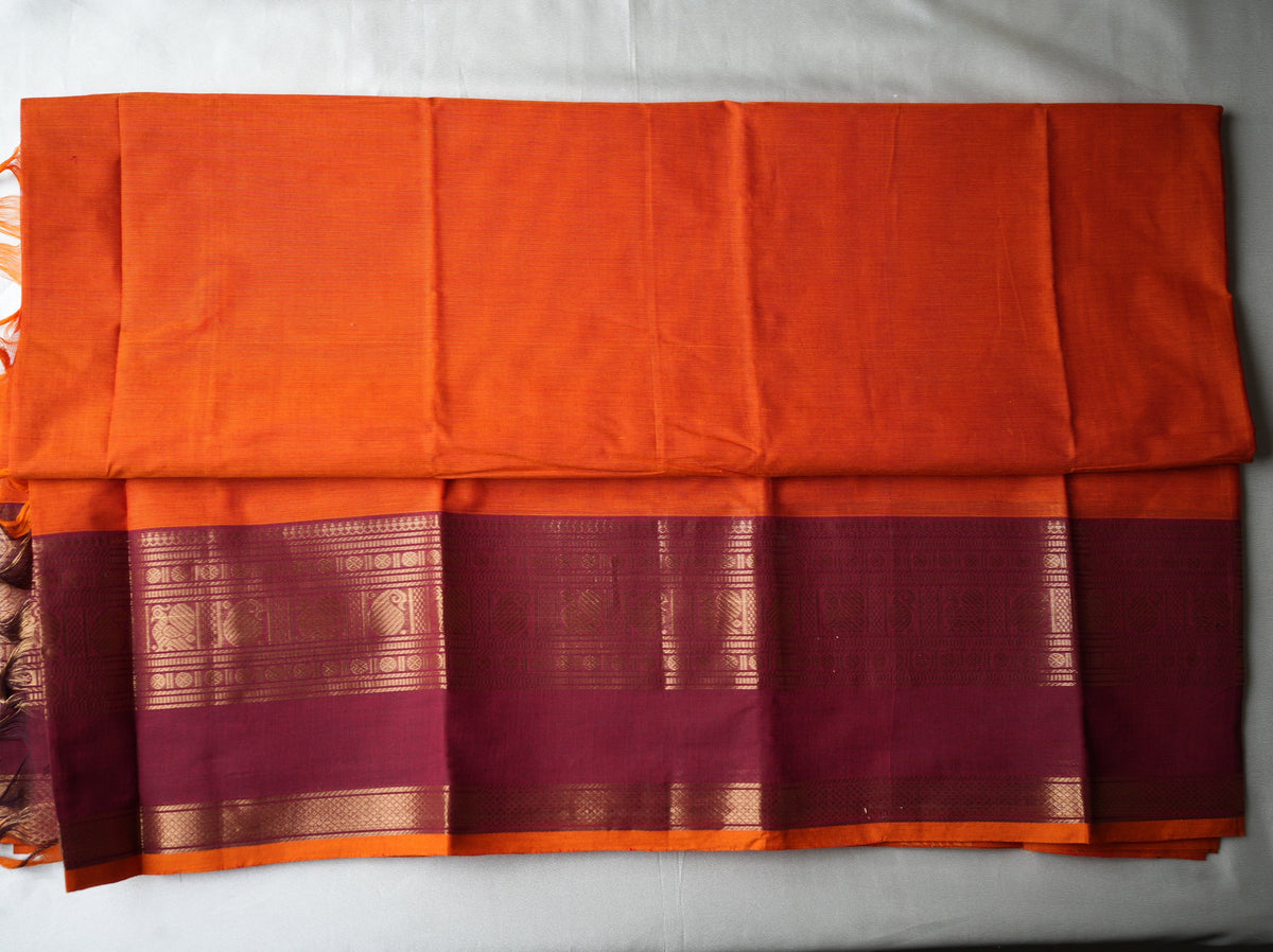 🍊 Bright Orange Pure Kanchi Cotton Saree with Maroon Zari Border & Striped Pallu ✨🥻 - SAROYA