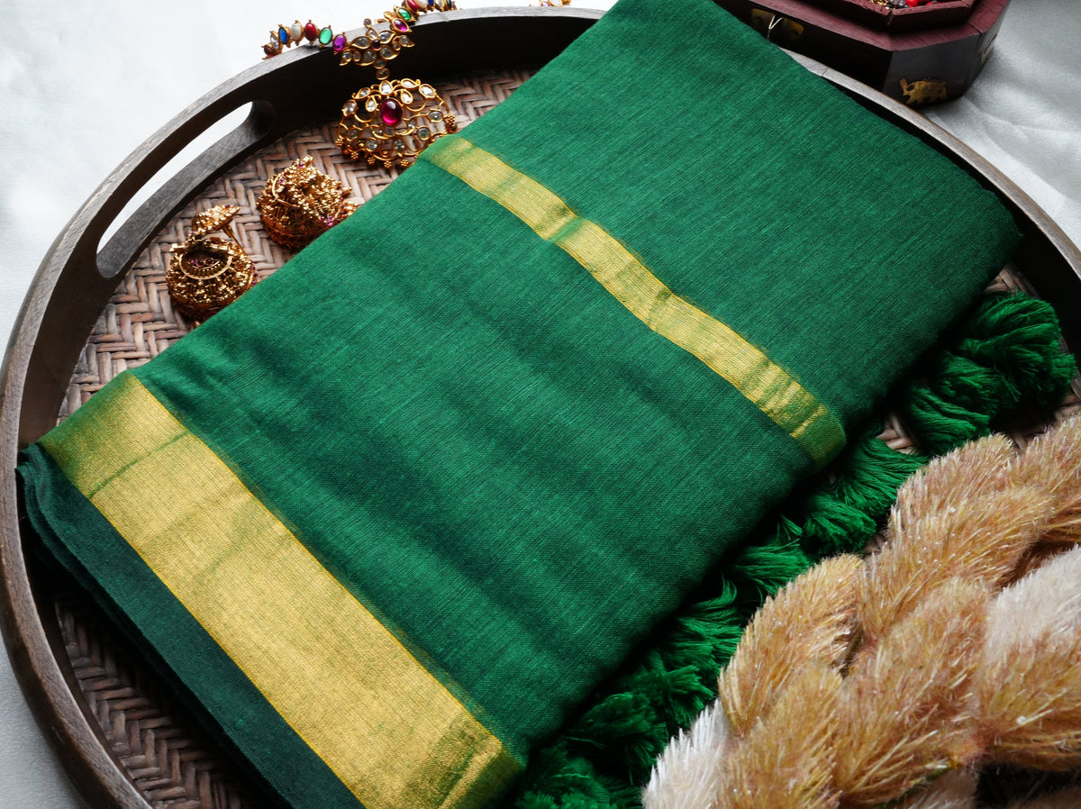 🌿 Emerald Green Pure Mul Cotton Saree with Golden Zari Border & Playful Tassels ✨🥻 - SAROYA