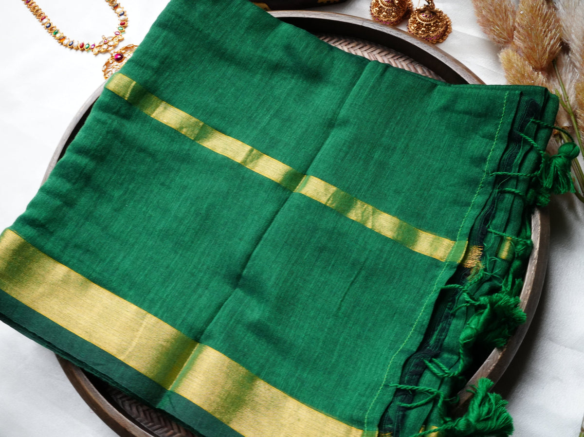 🌿 Emerald Green Pure Mul Cotton Saree with Golden Zari Border & Playful Tassels ✨🥻 - SAROYA
