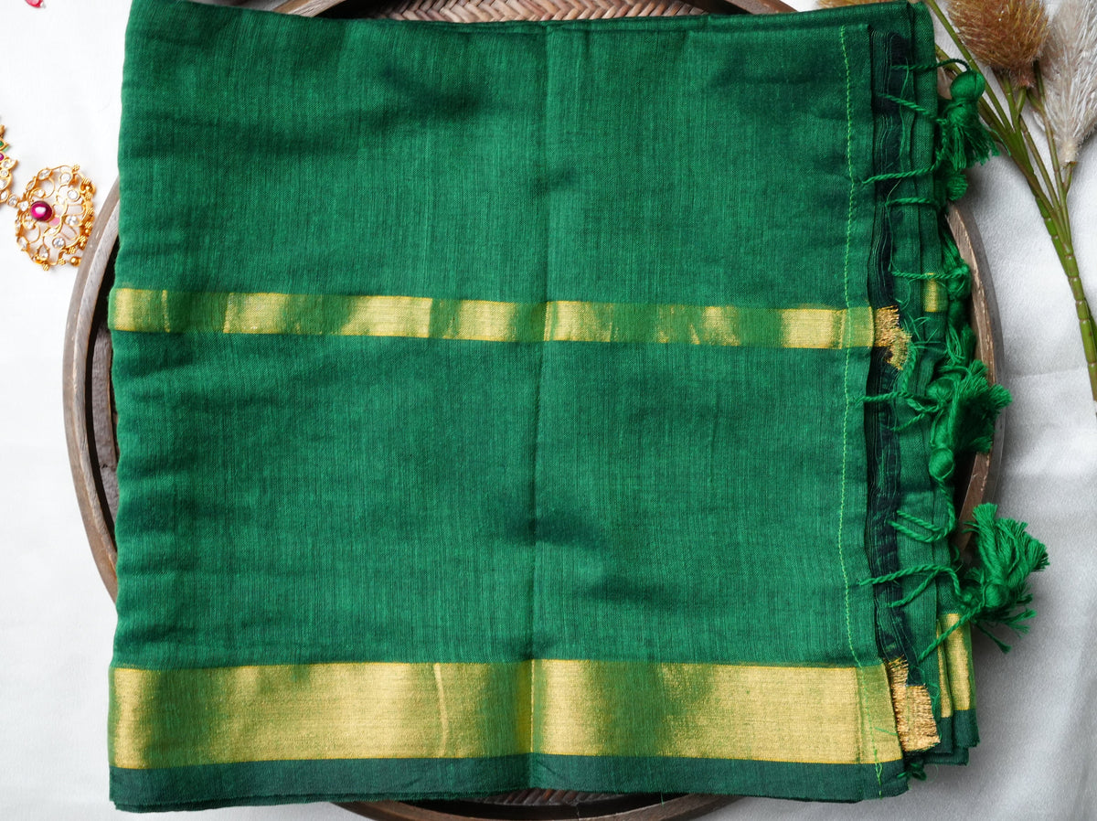 🌿 Emerald Green Pure Mul Cotton Saree with Golden Zari Border & Playful Tassels ✨🥻 - SAROYA
