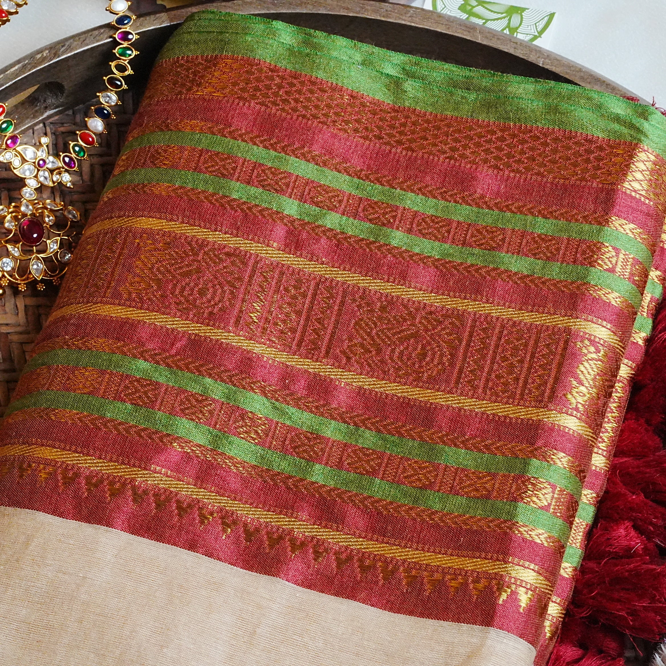 🌿 Festive Crimson, Emerald Green & Heritage Zari: Premium Mulcotton Saree 🪵 - SAROYA
