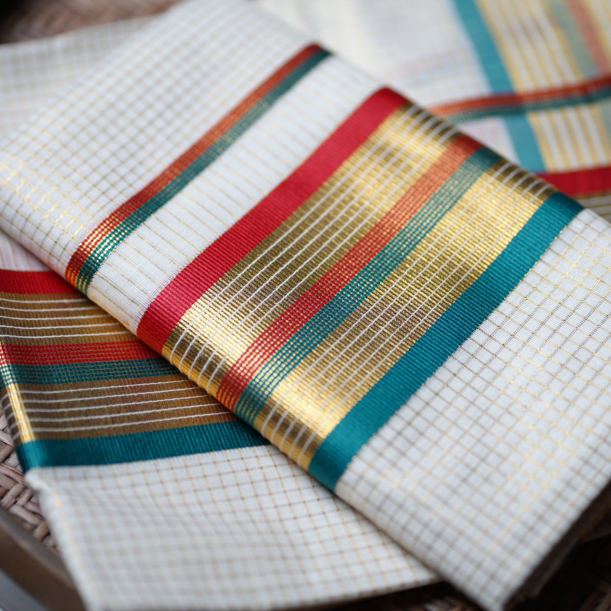 Festive Kaleidoscope: Premium Kerala Set Mundu with Gold Checks and Multi-Tone Accents - SAROYA