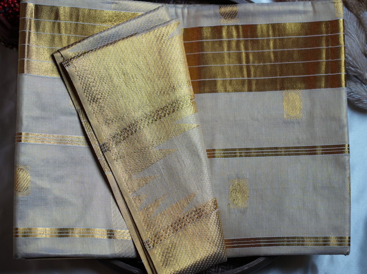 ✨ Premium Gold Tissue Kerala Saree with Geometric Zari Motifs 🌟 - SAROYA