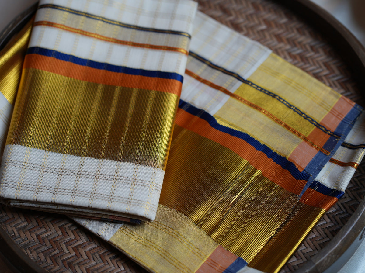 💙 Royal Sunset: Premium Kerala Set Mundu with Gold Checks, Royal Blue & Ochre Orange Borders 🟧 - SAROYA