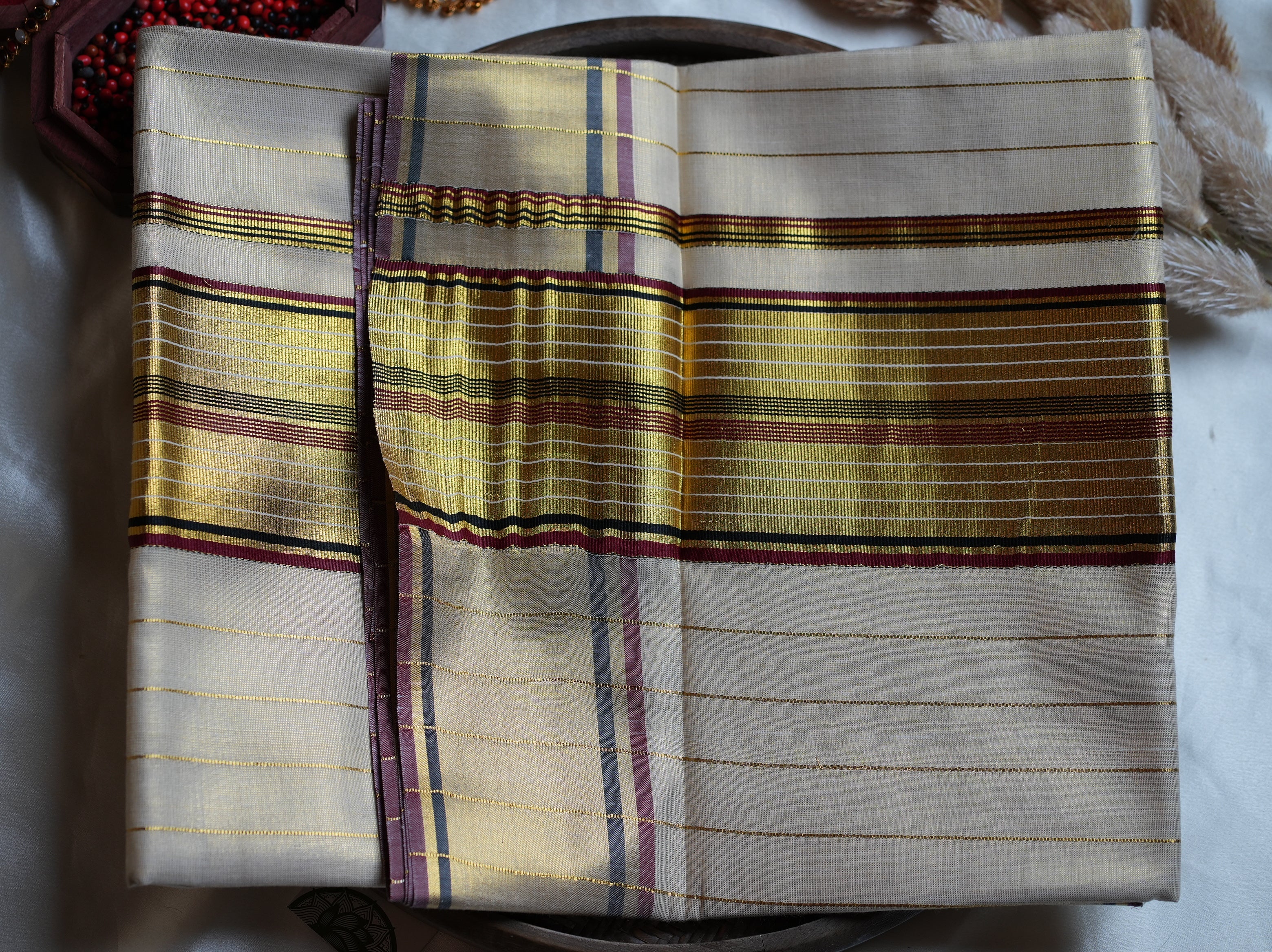 ✨ Tissue Kerala Saree with Maroon & Black Striped Kasavu Border ✨ - SAROYA